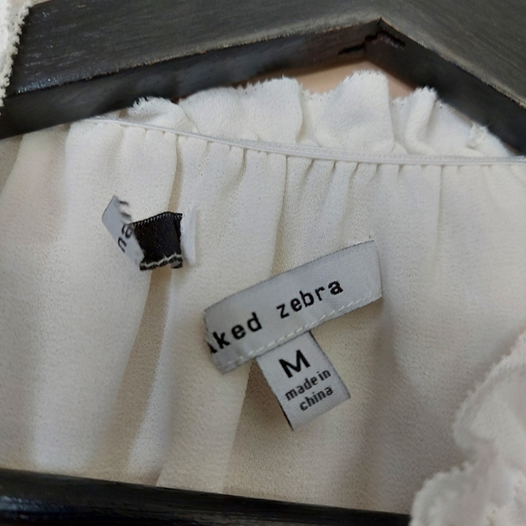 Naked Zebra sleeveless blouse with ruffle neckline details - Picture 5 of 7